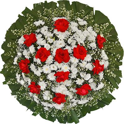 Coroa de flores com rosas vermelhas e flores brancas